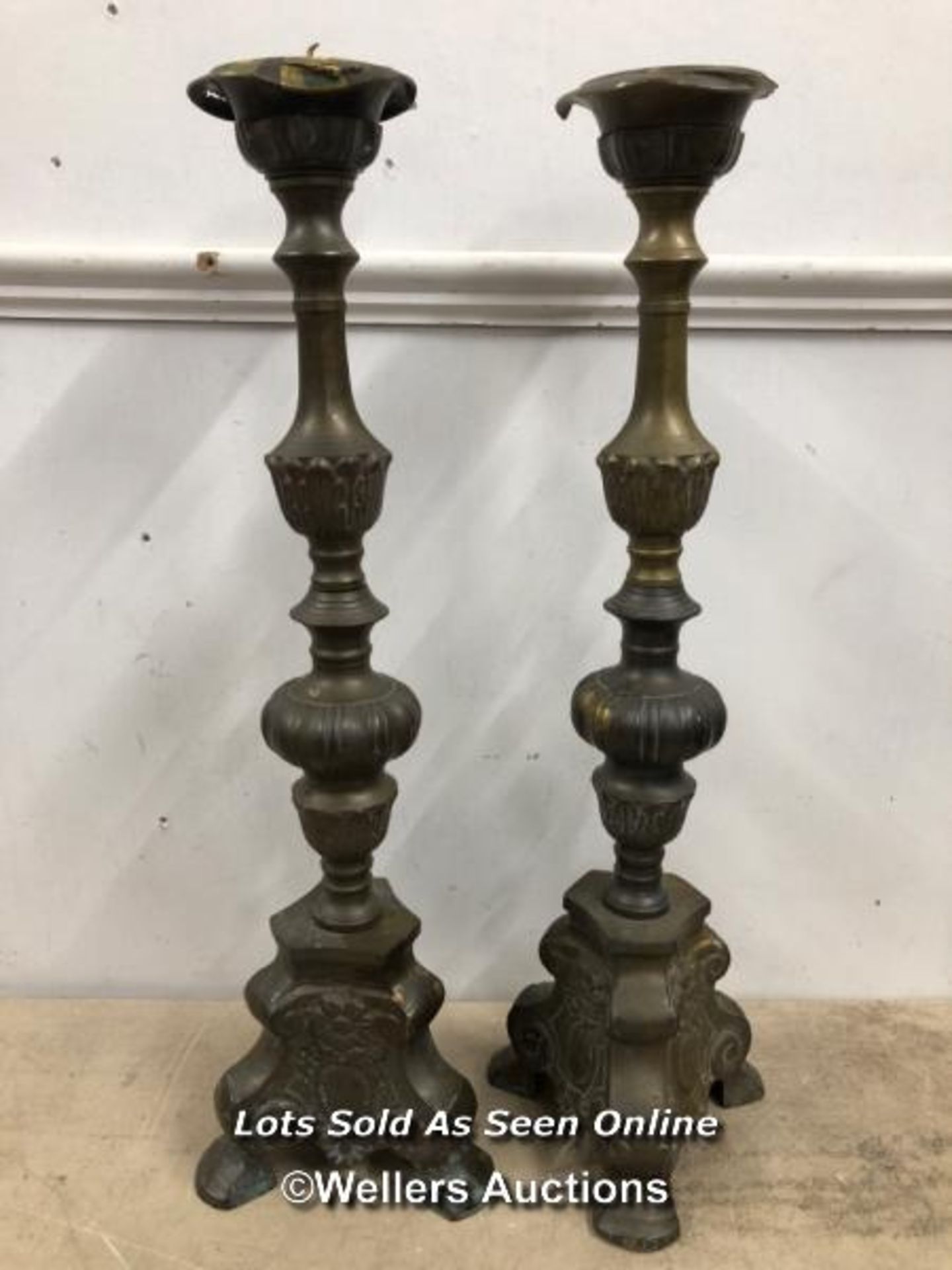 TWO TALL BRASS CANDLE STICK HOLDERS, 61CM (H)