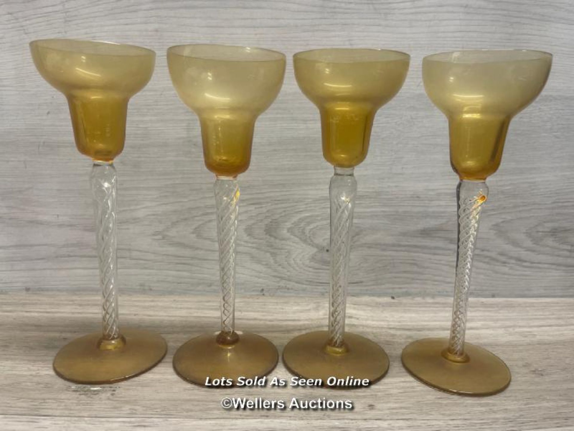 FOUR VINTAGE TWIST STEM CHAMPAGNE GLASSES, IN GOOD CONDITION