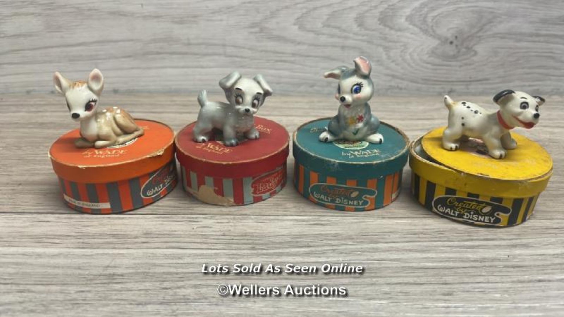 FOUR DISNEY HAT BOX SERIES FUGURINES BY WADE INCLUDING BAMBI, THUMPER, SCAMP AND LUCKY