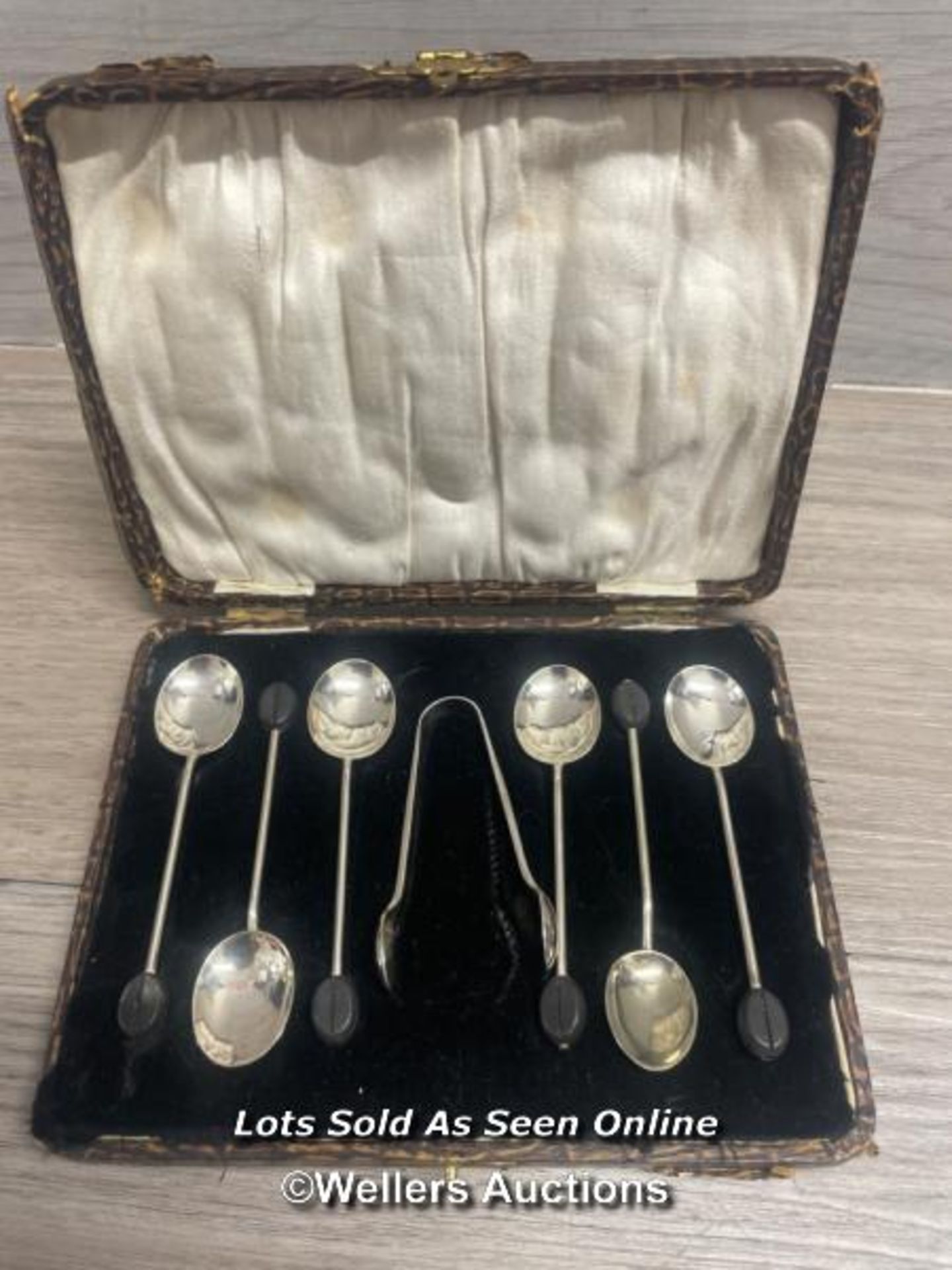 A SET OF HALLMARKED SILVER COFFEE SPOONS