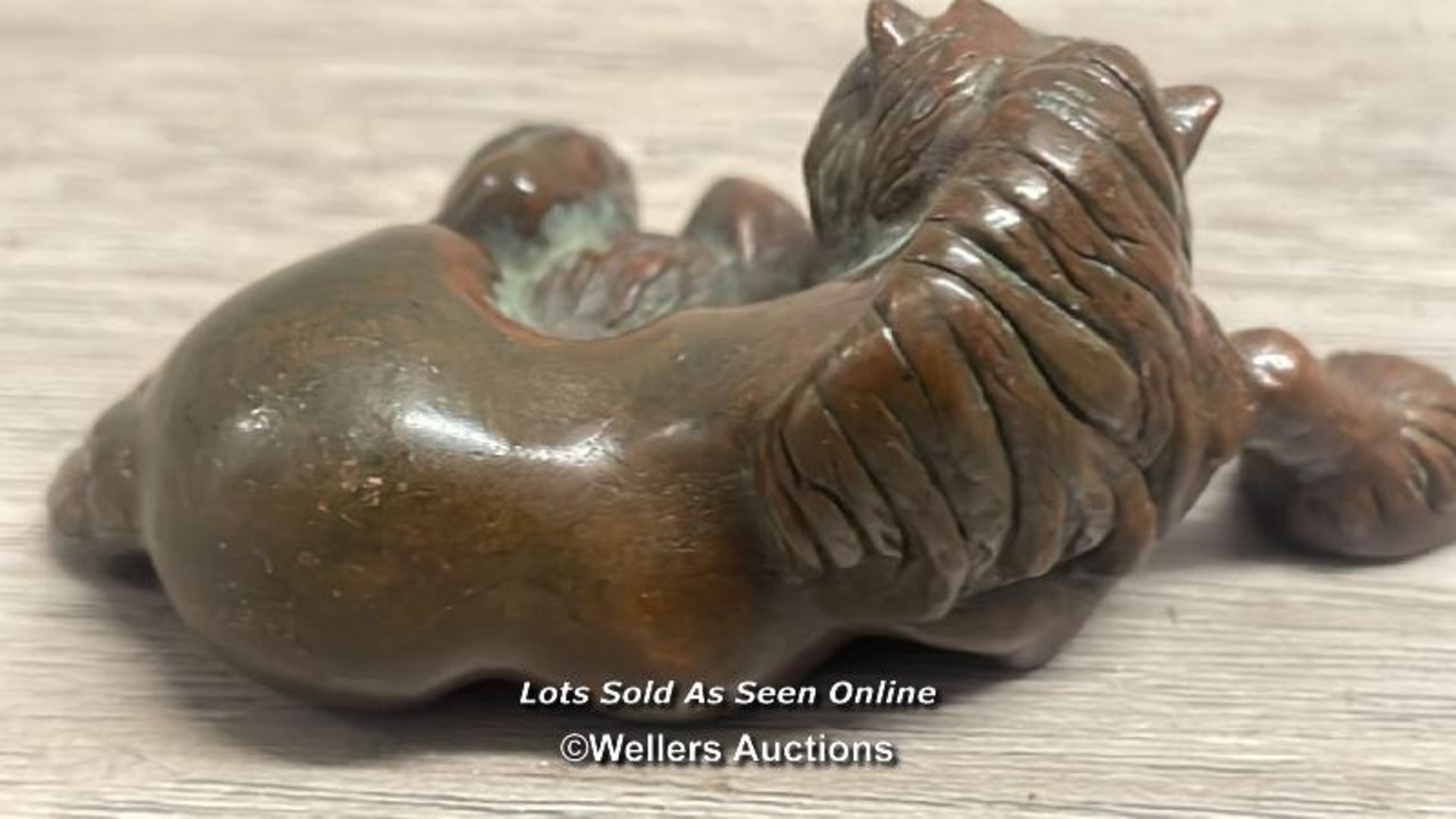 BRONZE LYING HORSE, INDISTICT MARKS TO THE BASE, 4CM HIGH - Image 2 of 3