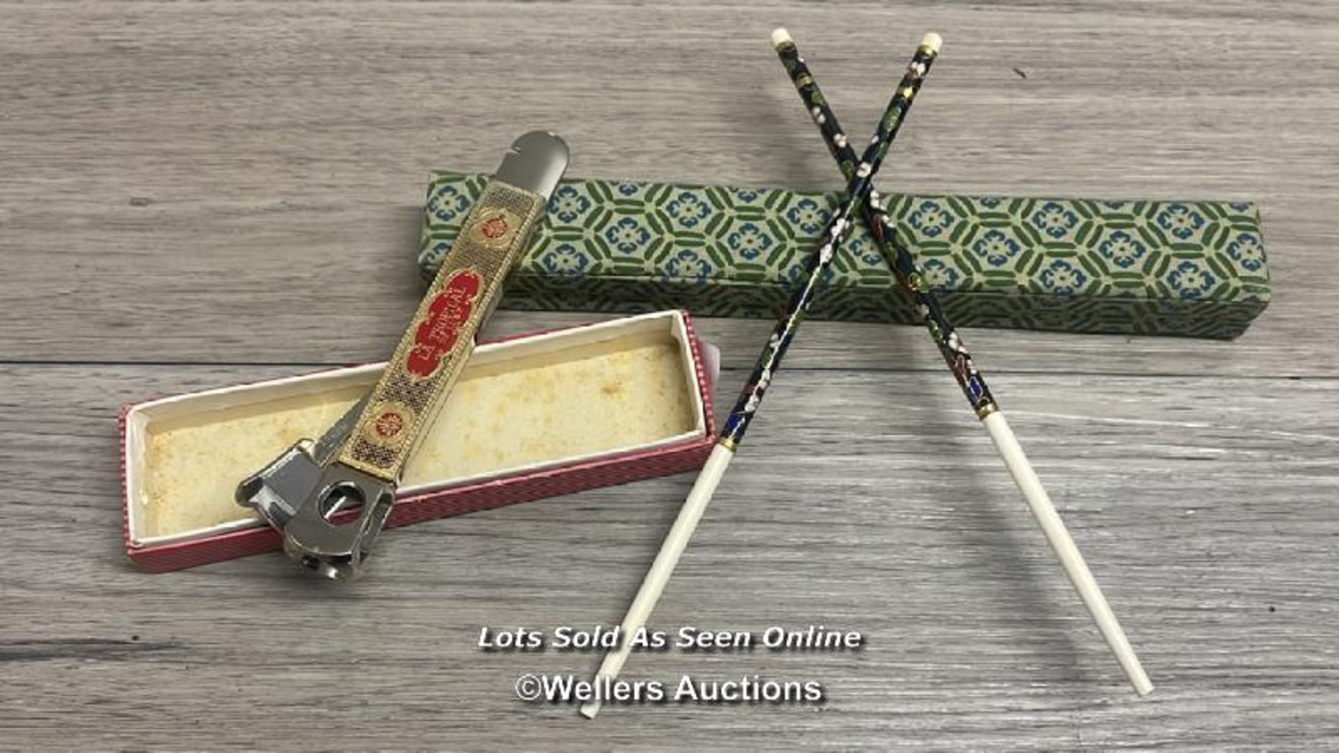 BOXED LA TROPICAL CIGAR CUTTER AND CHOPSTICKS WITH ENAMEL DECORATION