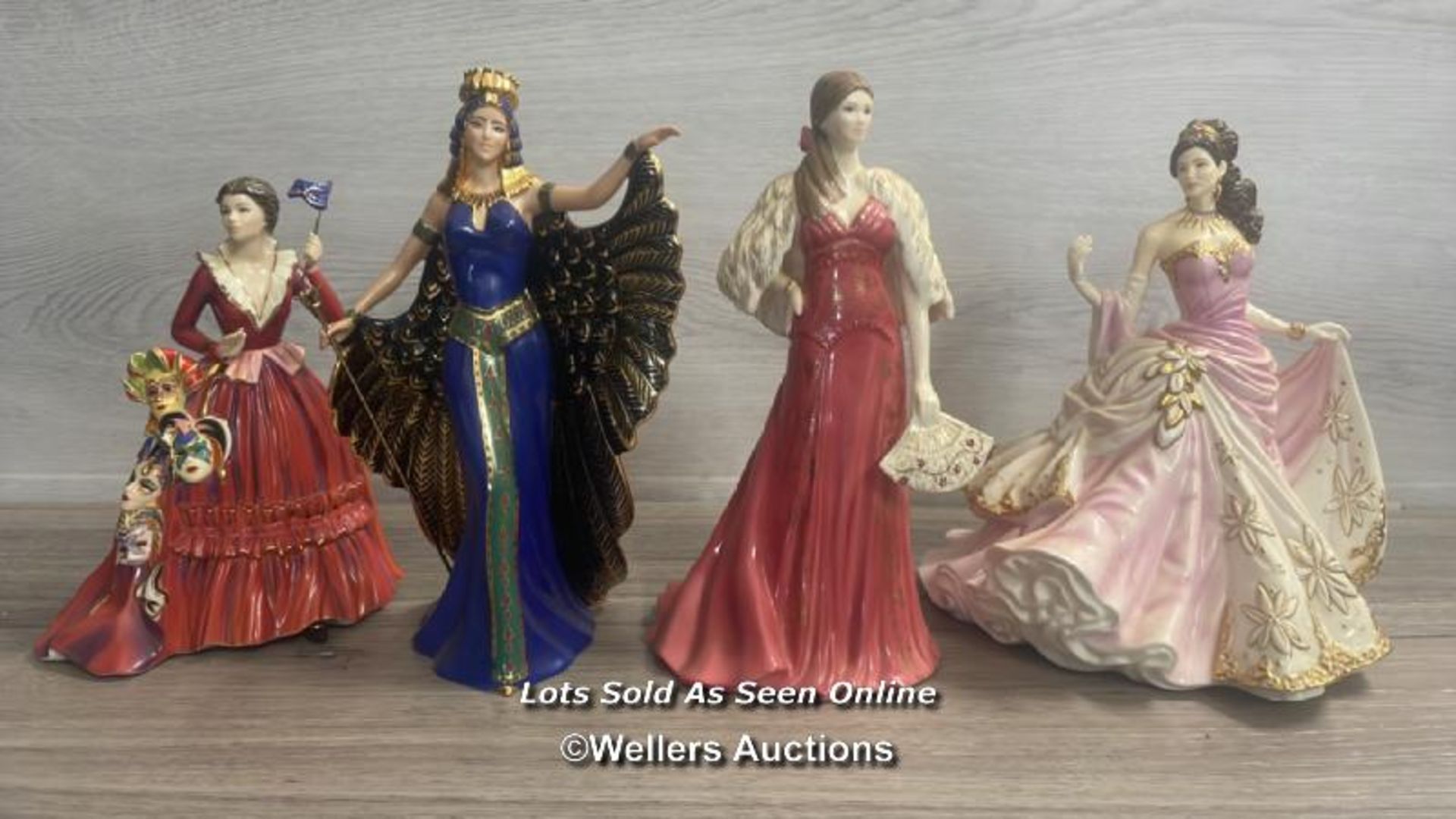 FOUR FIGURINES INCLUDING THE MASK SELLER, CLEOPATRA, JENNIFER AND ANASTASIA