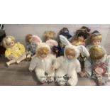 NINE COLLECTABLE PORCALAIN DOLLS