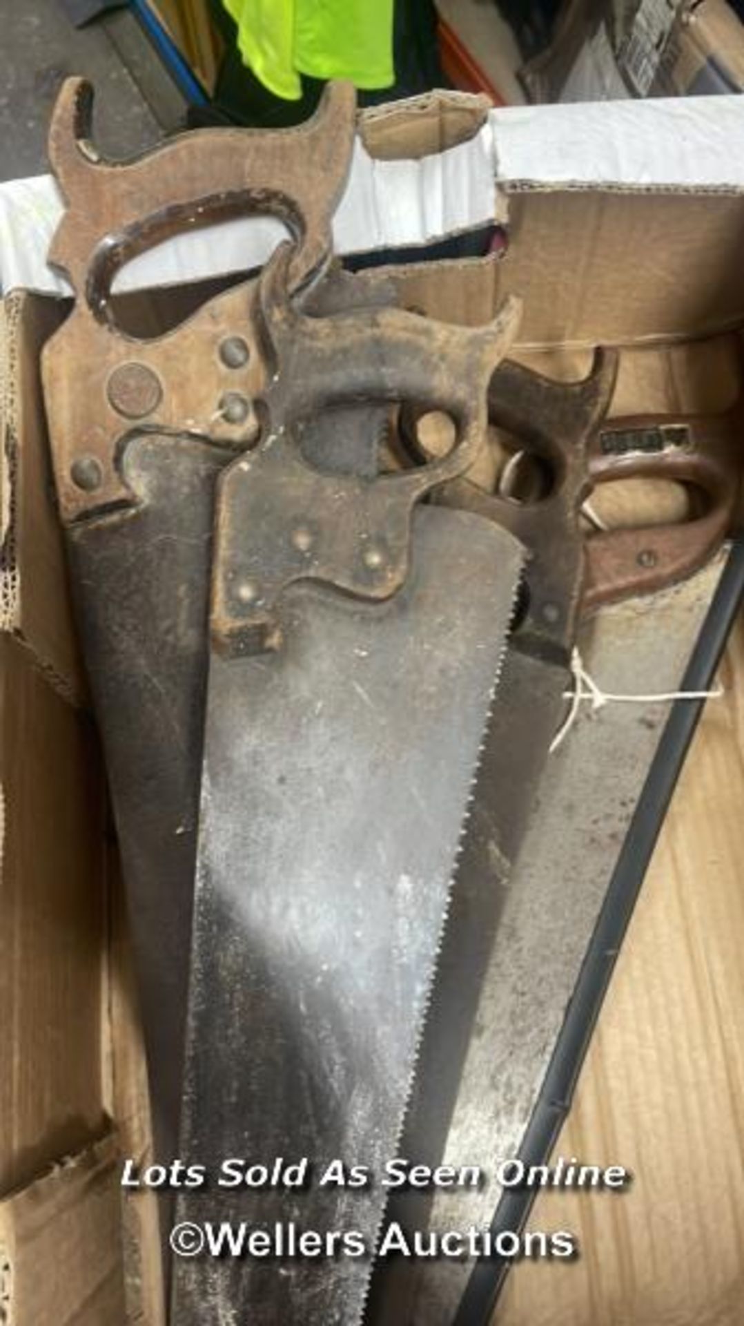 FOUR VINTAGE HAND SAWS INCLUDING TAVLON AND SALMANS