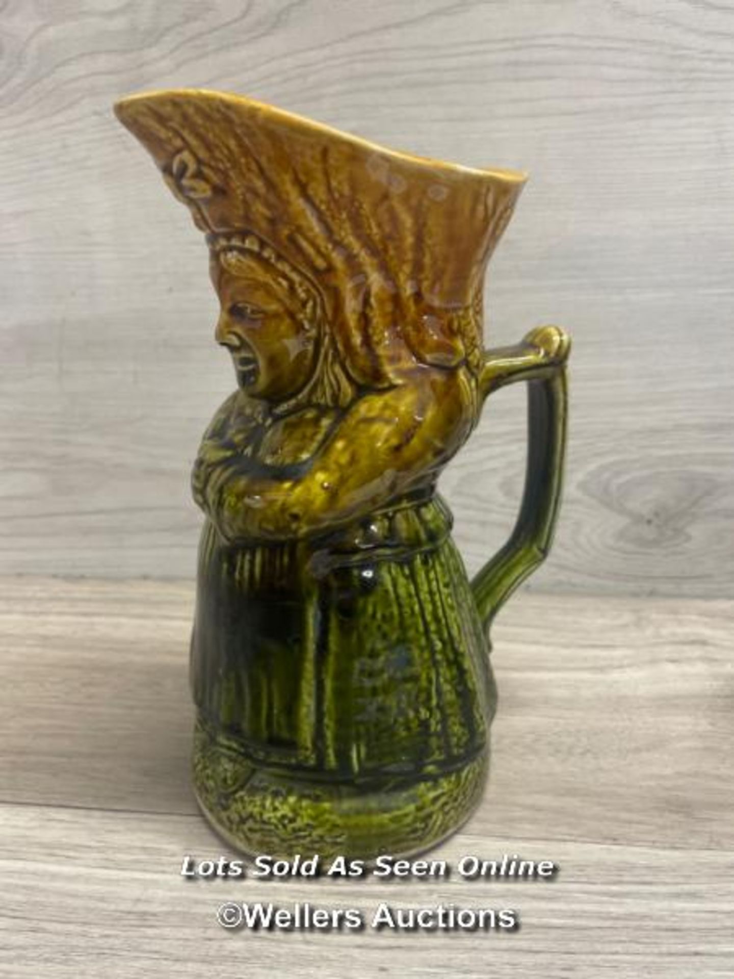 LARGE TOBY JUG VASE OF A LADY WITH IN GREEN SKIRT, 9" HIGH