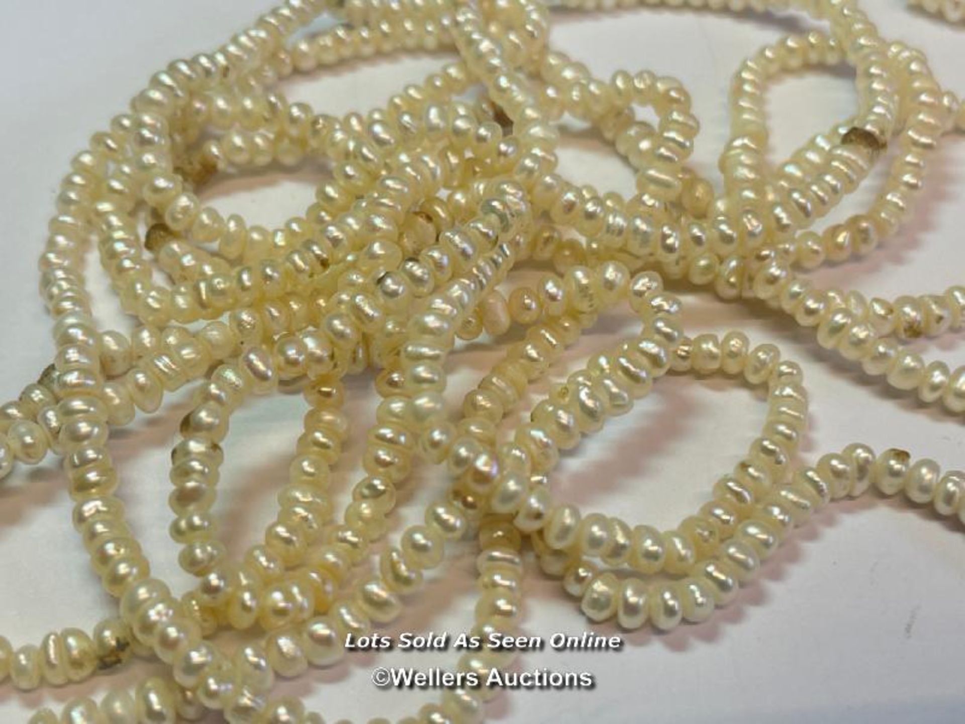 TWO LONG UNKNOTTED ROWS OF FRESHWATER PEARLS, EACH ROW APPROX. 148CM - Image 2 of 3