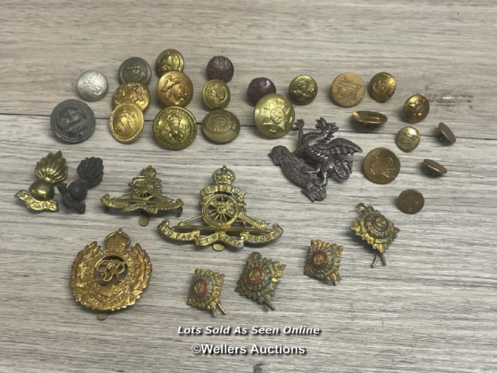 COLLECTION OF MILITARY BADGES INCLUDING ONE WWII GERMAN BUTTON