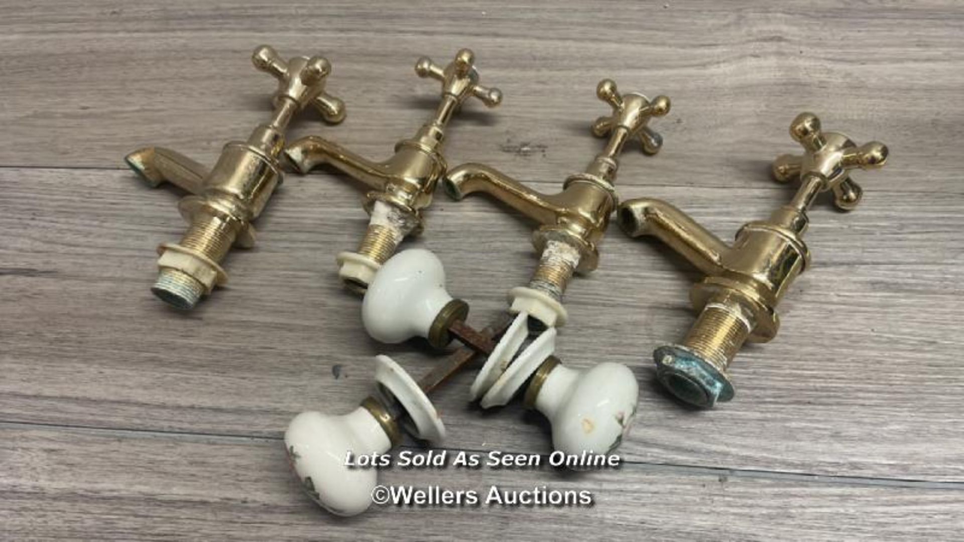 FOUR BRASS TAPS AND VINTAGE DOOR KNOBS