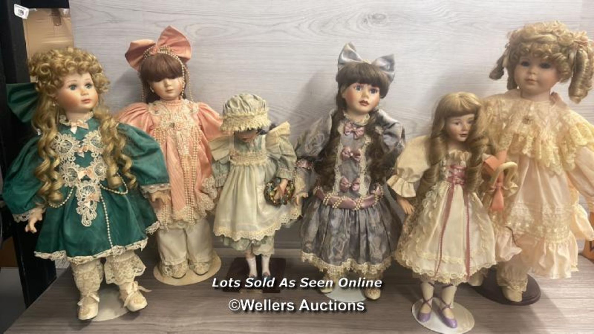 SIX PORCALAIN DOLLS ON STANDS INCLUDING ALBERON,