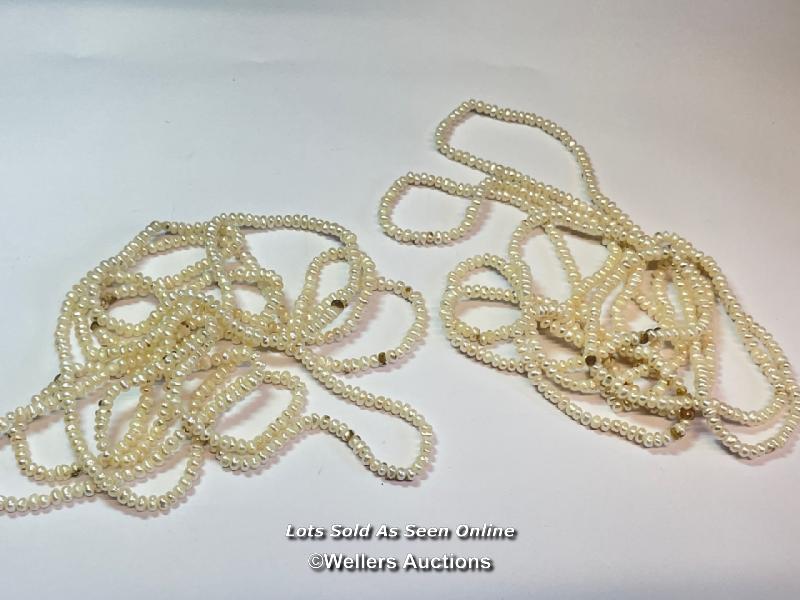 TWO LONG UNKNOTTED ROWS OF FRESHWATER PEARLS, EACH ROW APPROX. 148CM