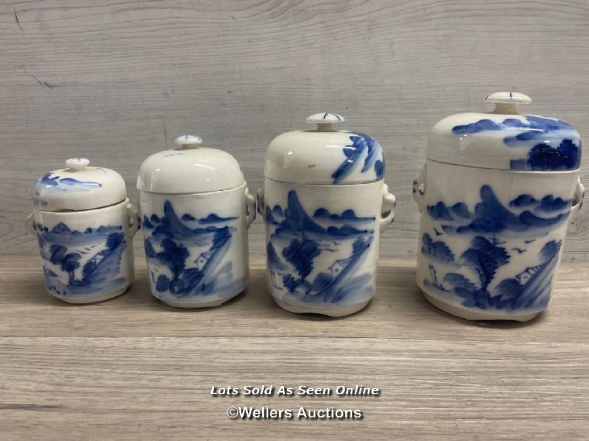 *Graduated set of oriental blue & white storage jars with covers, tallest 19cm high