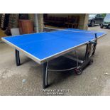 *CORNILLEAU FOLDING TABLE TENNIS TABLE WITH NET, NET NEEDS REPLACING ND NET FIXINGS NEED SORTING -