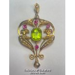 ART NOUVEAU PENDANT STAMPED 15CT SET WITH PERIDOT, RUBIES AND SPLIT SEED PEARLS. WEIGHT 3.9G,