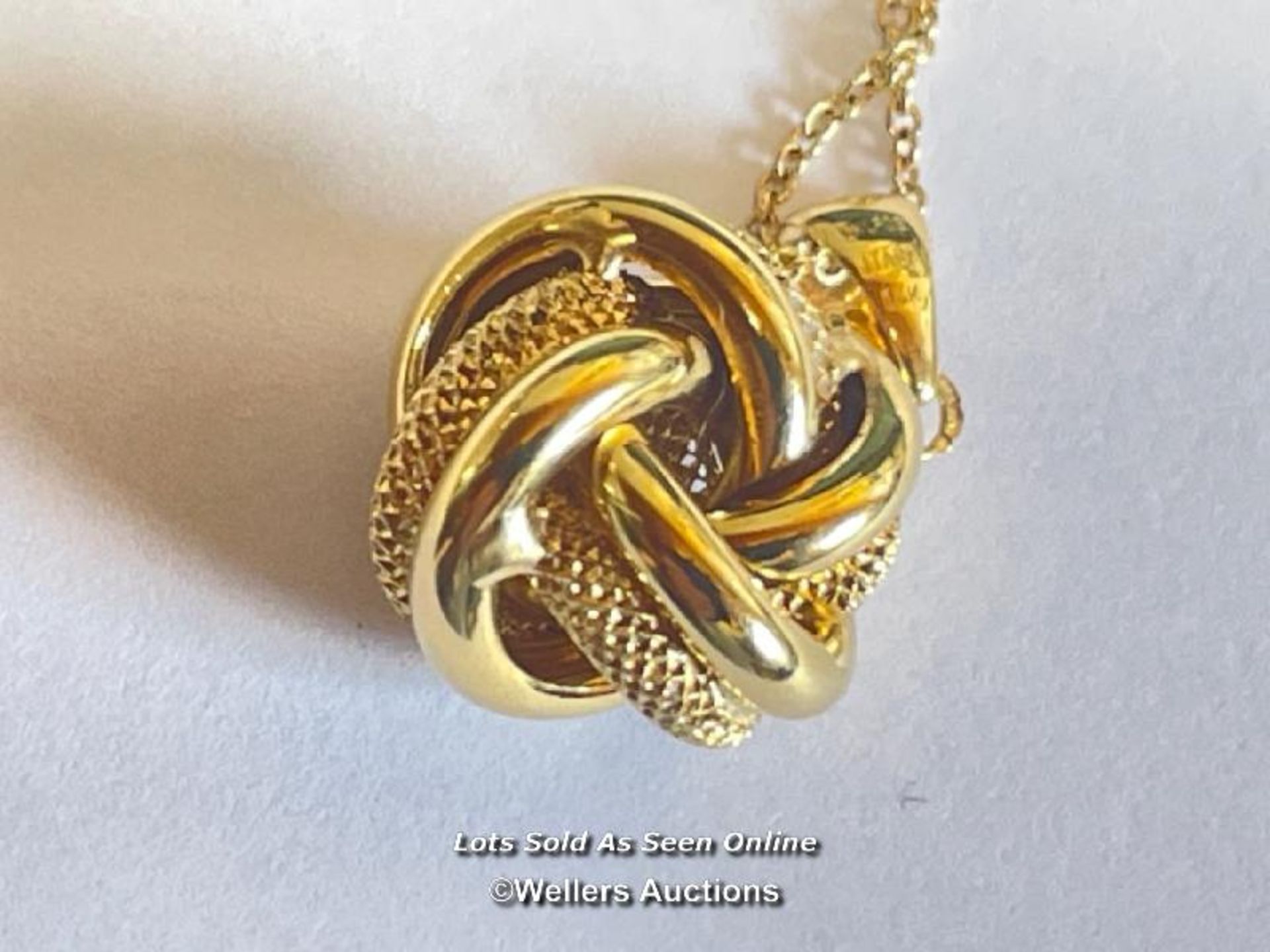 YELLOW GOLD LOVE KNOT PENDANT AND CHAIN STAMPED 14CT - Image 3 of 4