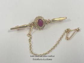 RUBY AND DIAMOND BAR BROOCH WITH SAFETY CHAIN, RUBY ESTIMATED WEIGHT 0.54CT, DIAMONDS ESTIMATED