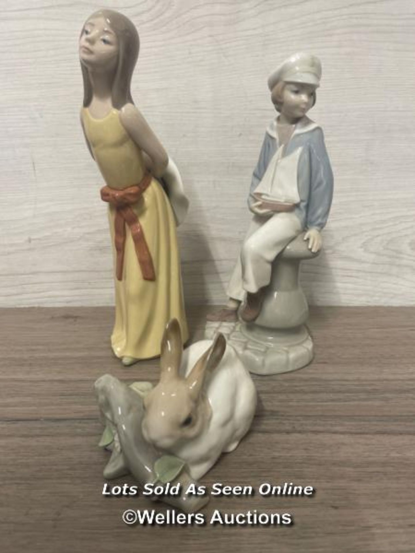 THREE LLADRO FIGURINES TO INCLUDE "BOY WITH YACHT" NO.4810, "GIRL WITH STRAW HAT" NO.5006 AND RABBIT
