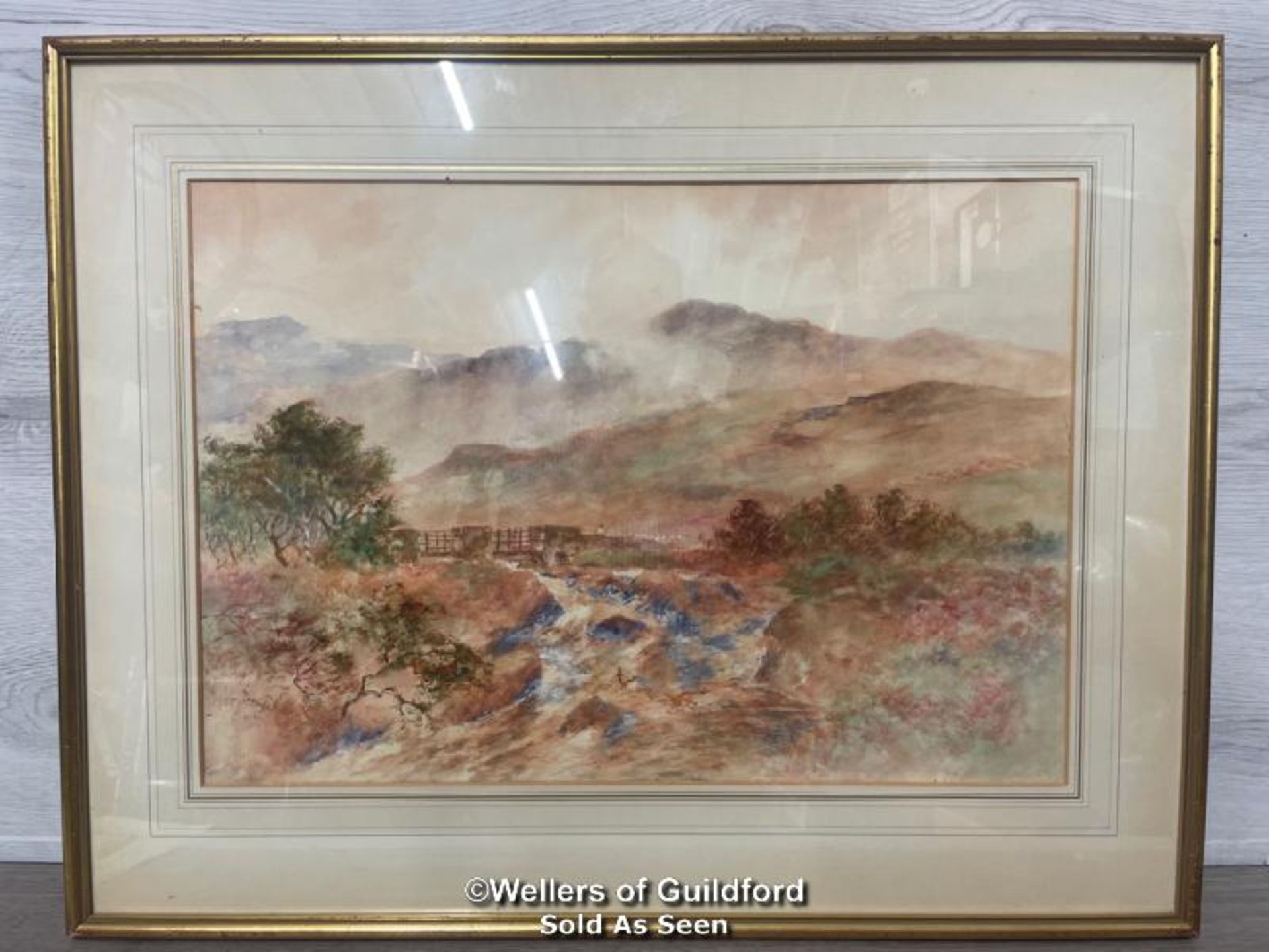 HENRY WOODS (1842 - 1921) WATERCOLOUR LANDSCAPE OF A STREAM WITH HILLS, SIGNED, 55 X 38CM