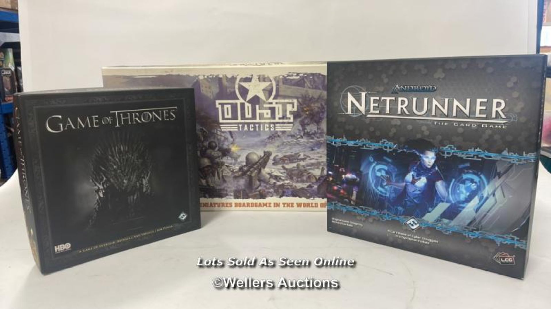 Fantasy Flight gamnes, three to include Dust Tactics, Netrunner (unused) and Game of Thrones