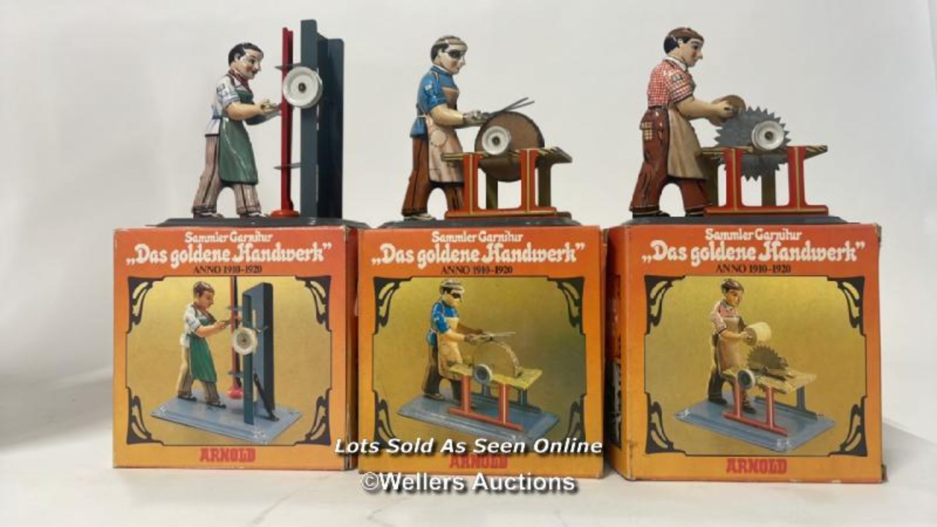 Three boxed Sammler Garnilur tin toy "Arnold" craftsman, wind up tin Elephant on a bike and a - Image 2 of 7