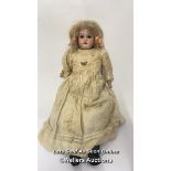 *Porcelain headed doll, impressed made in Germany, 50cm high