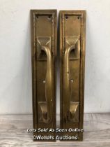 *MATCHING PAIR OF BRASS PULL HANDLES WITH RAISED BORDER, AGAINST RECTANGULAR PLATE, 38CM (L) X