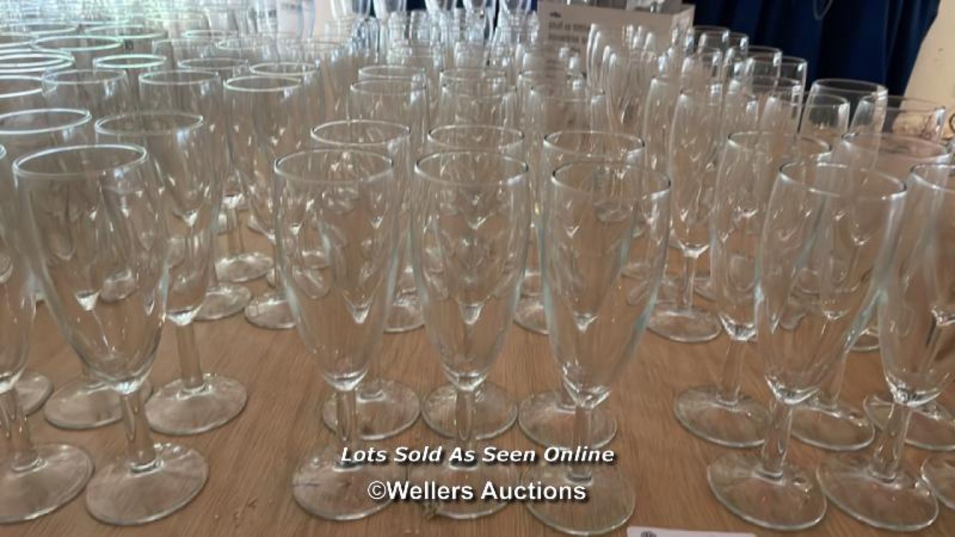 APPROX. 100X CHAMPAGNE FLUTES / COLLECTION LOCATION: OLD WOKING DISTRICT RECREATION CLUB, 33