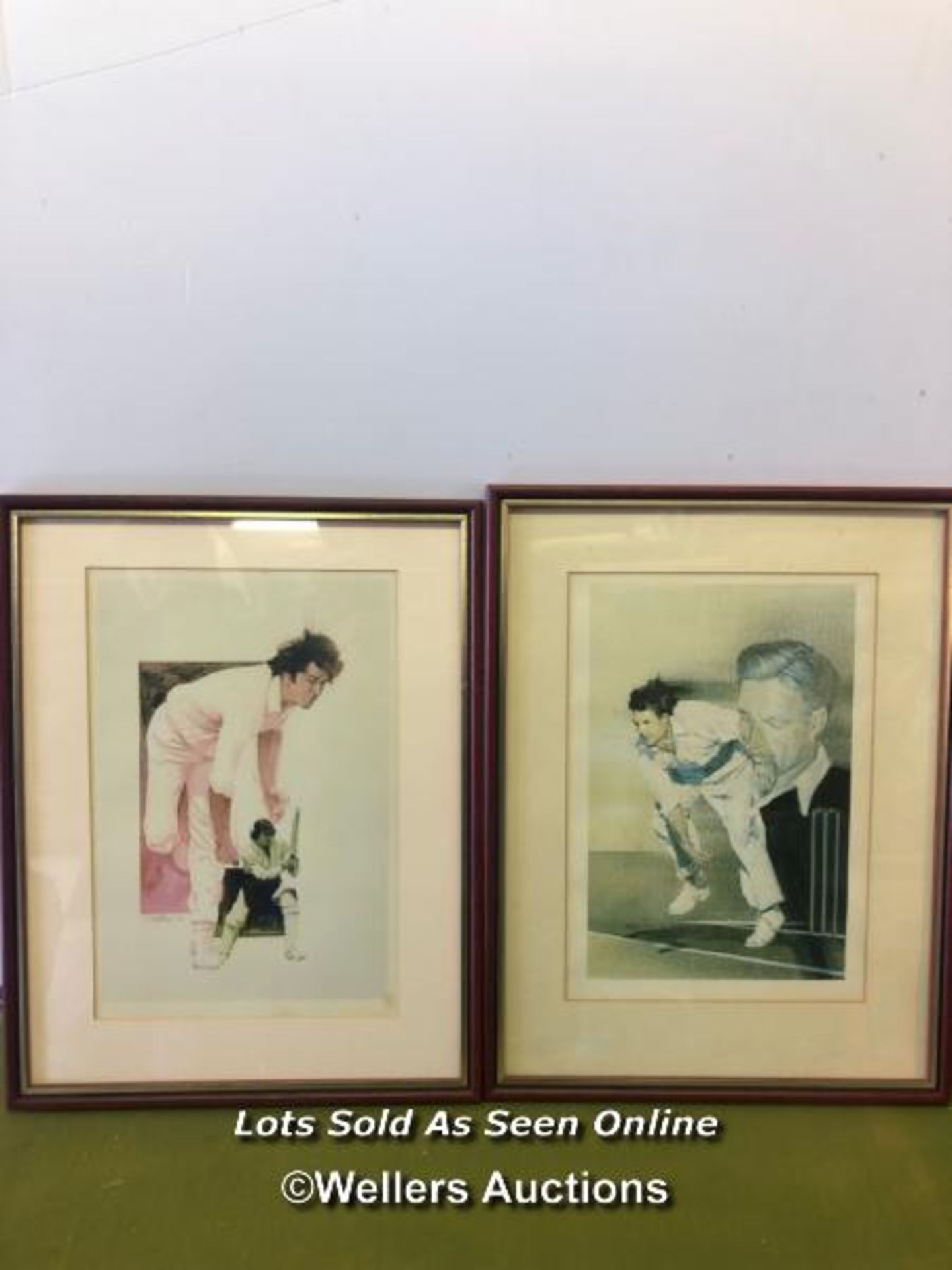 TWO FRAMED AND GLAZED PRINTS OF CRICKETERS, INCLUDING ONE OF IMRAN KHAN. THE LARGEST 42.5CM X 32.
