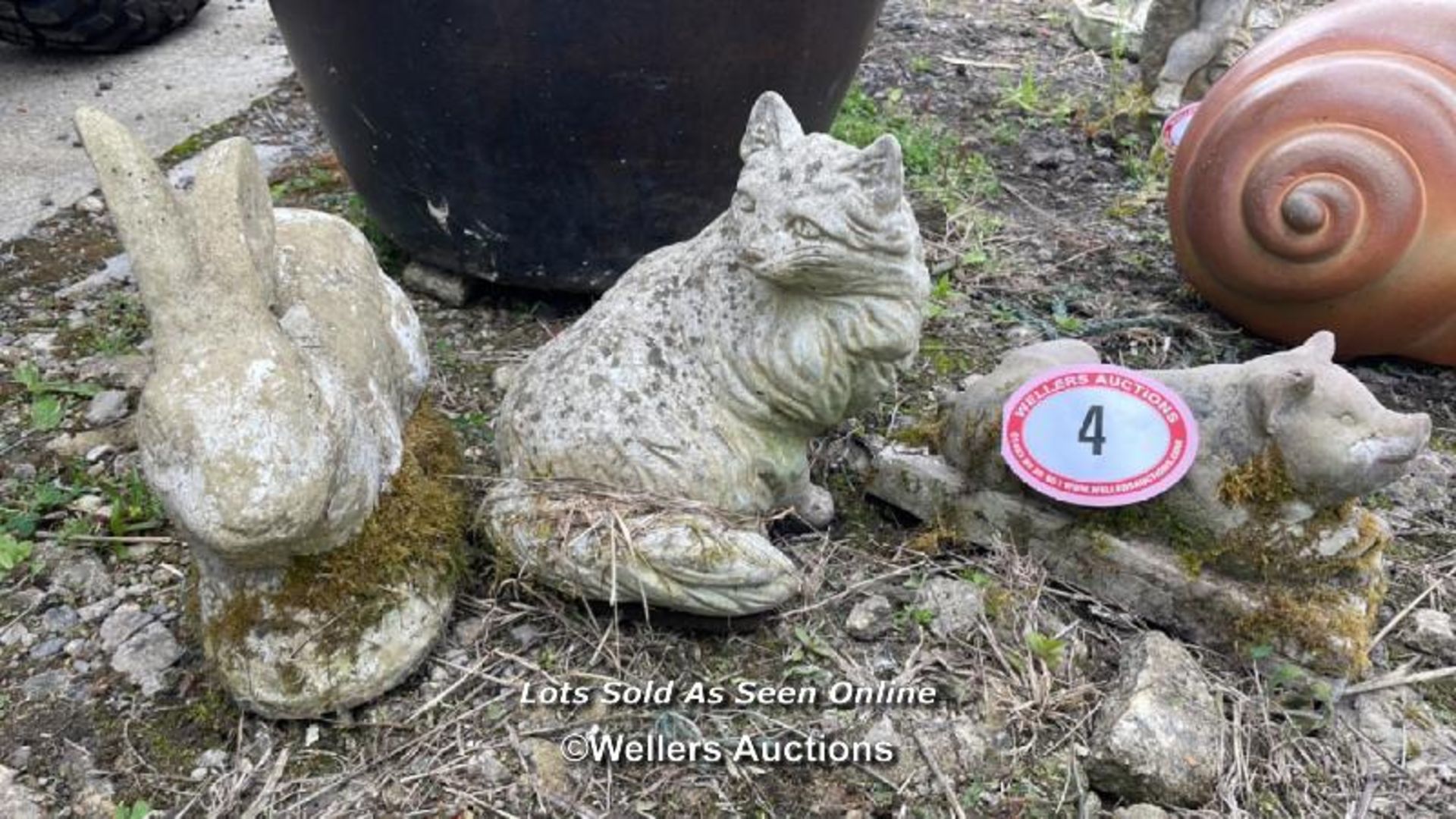 *THREE RECONSTITUTED STONE ORNAMENTS, CAT, RABBIT AND A PIG, LARGEST 26CM (H) X 28CM (L) /