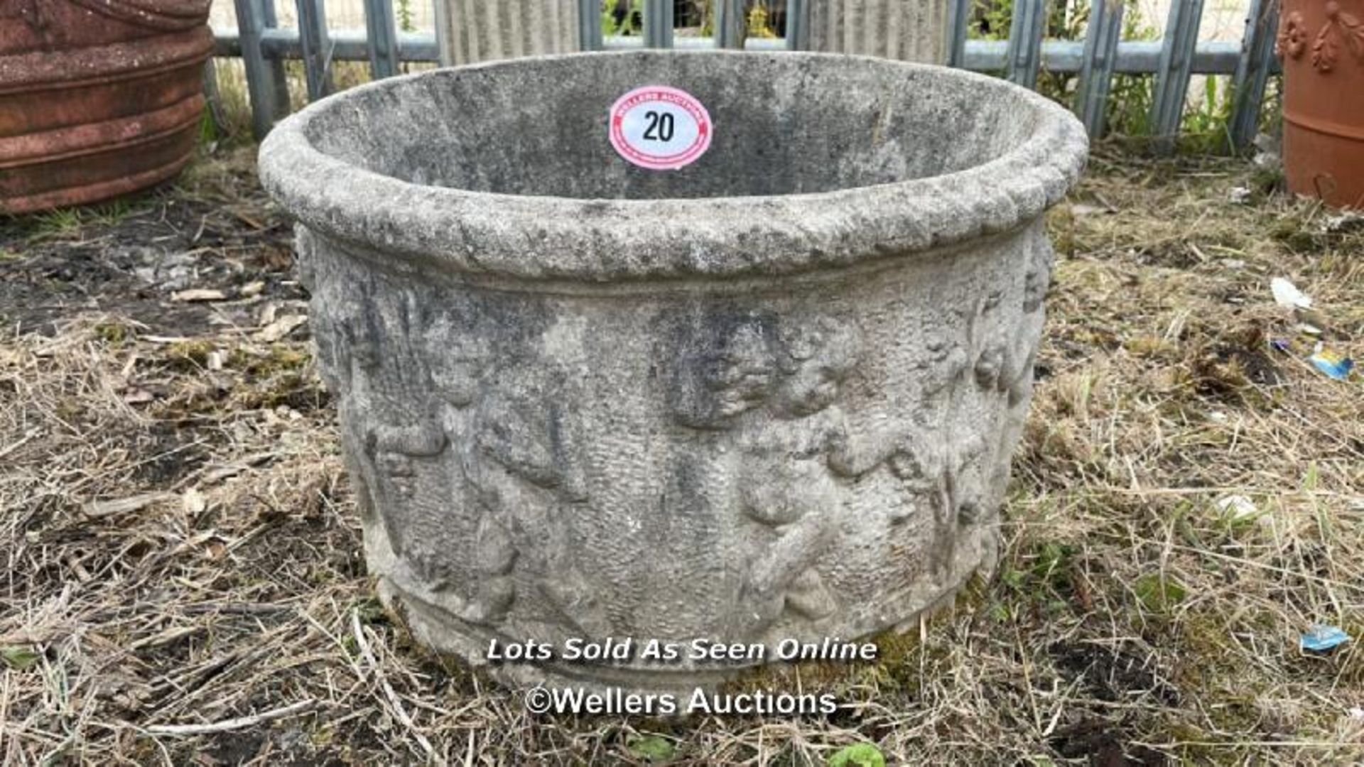 *RECONSTITUTED STONE POT DECORATED WITH PRANCING CHERUBS, 37CM (H) X 60CM (DIA) / COLLECTION LOCATI