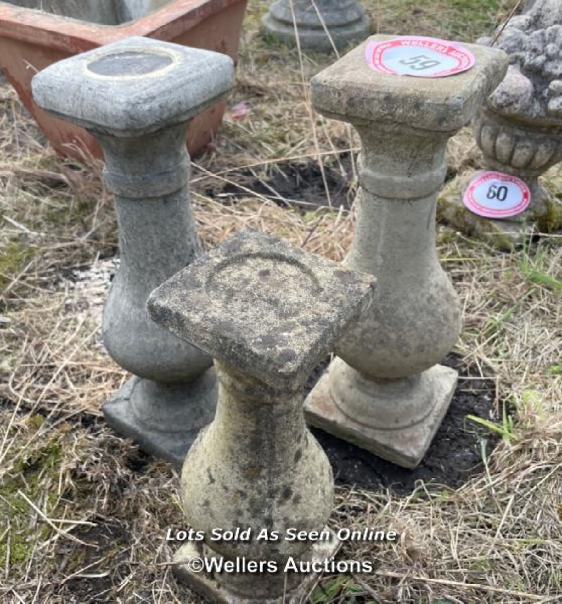 *THREE ASSORTED RECONTITUTED STONE CANDLE STICK HOLDERS, 45.5CM (H) / COLLECTION LOCATION: