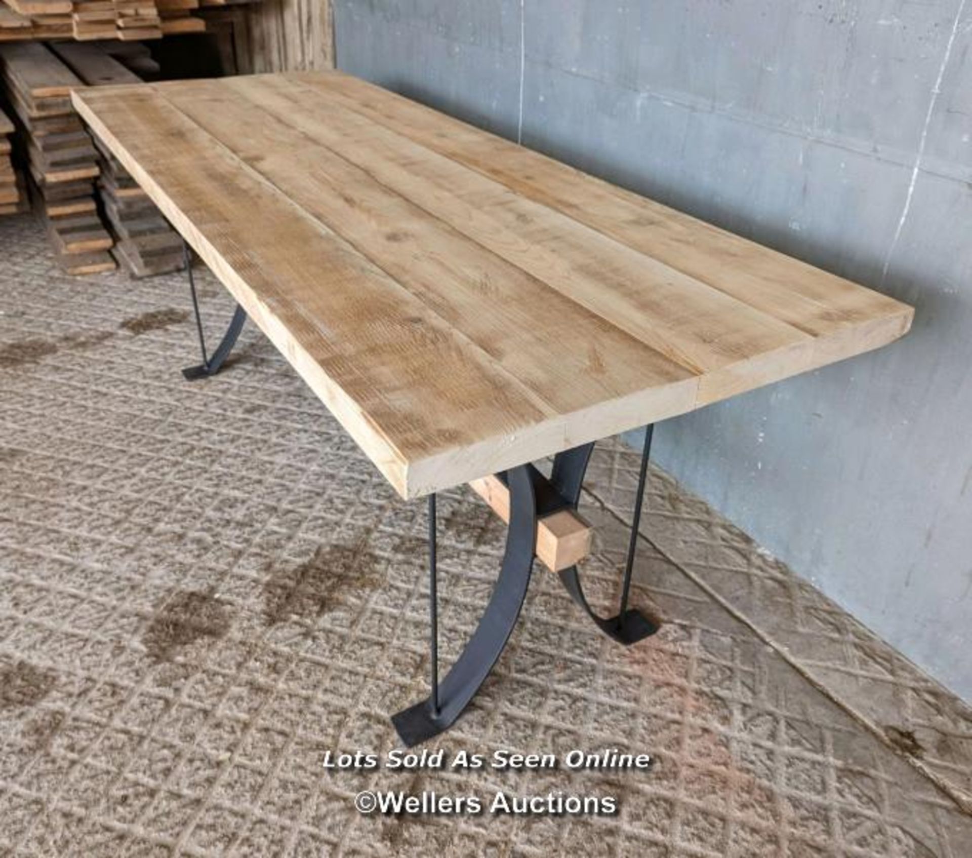 Dining table with wrought iron base and reclaimed pine top and stretcher. 8 seater. 198cm L x 78cm W