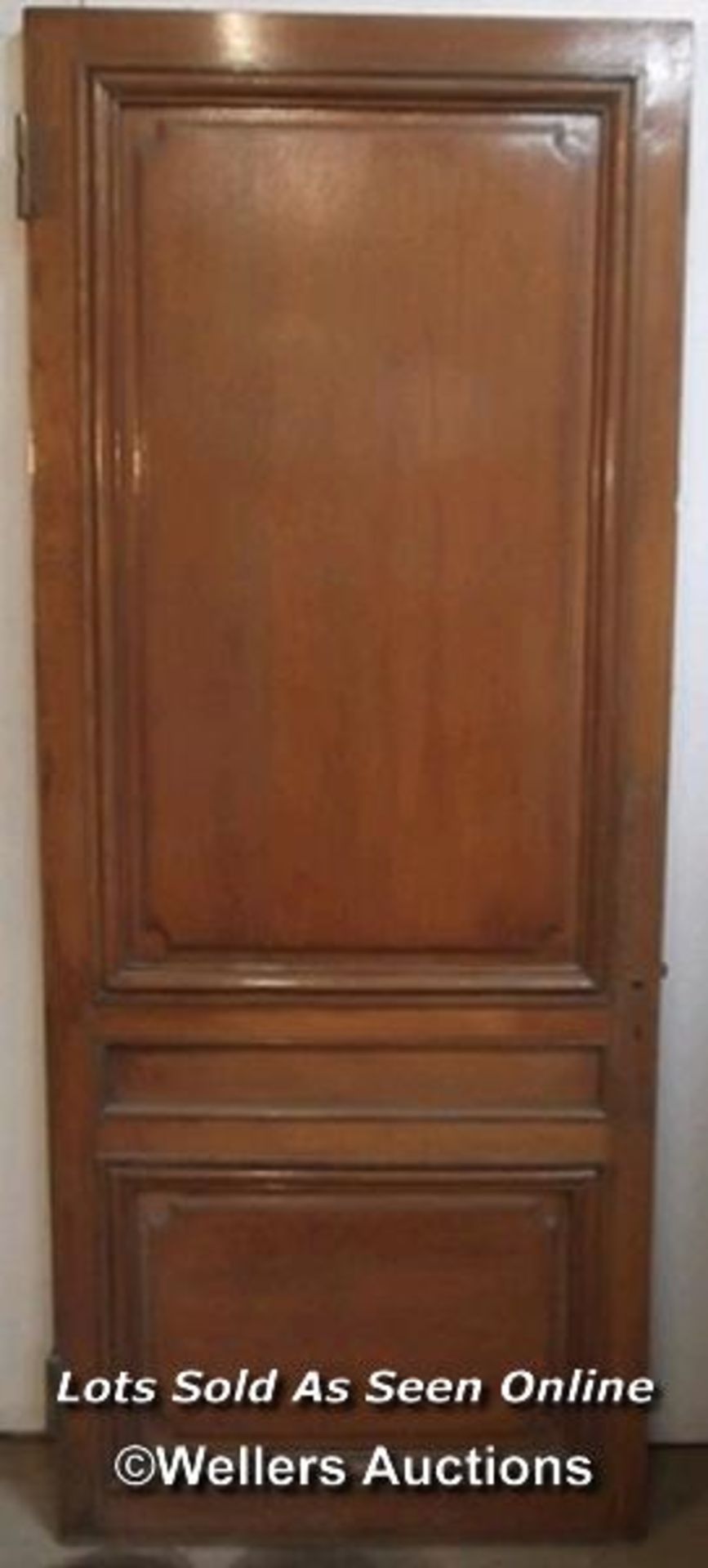 An Edwardian oak 3 paneled door (81cm x 201cm x 3.5cm) plus a French oak and pine 3 paneled door