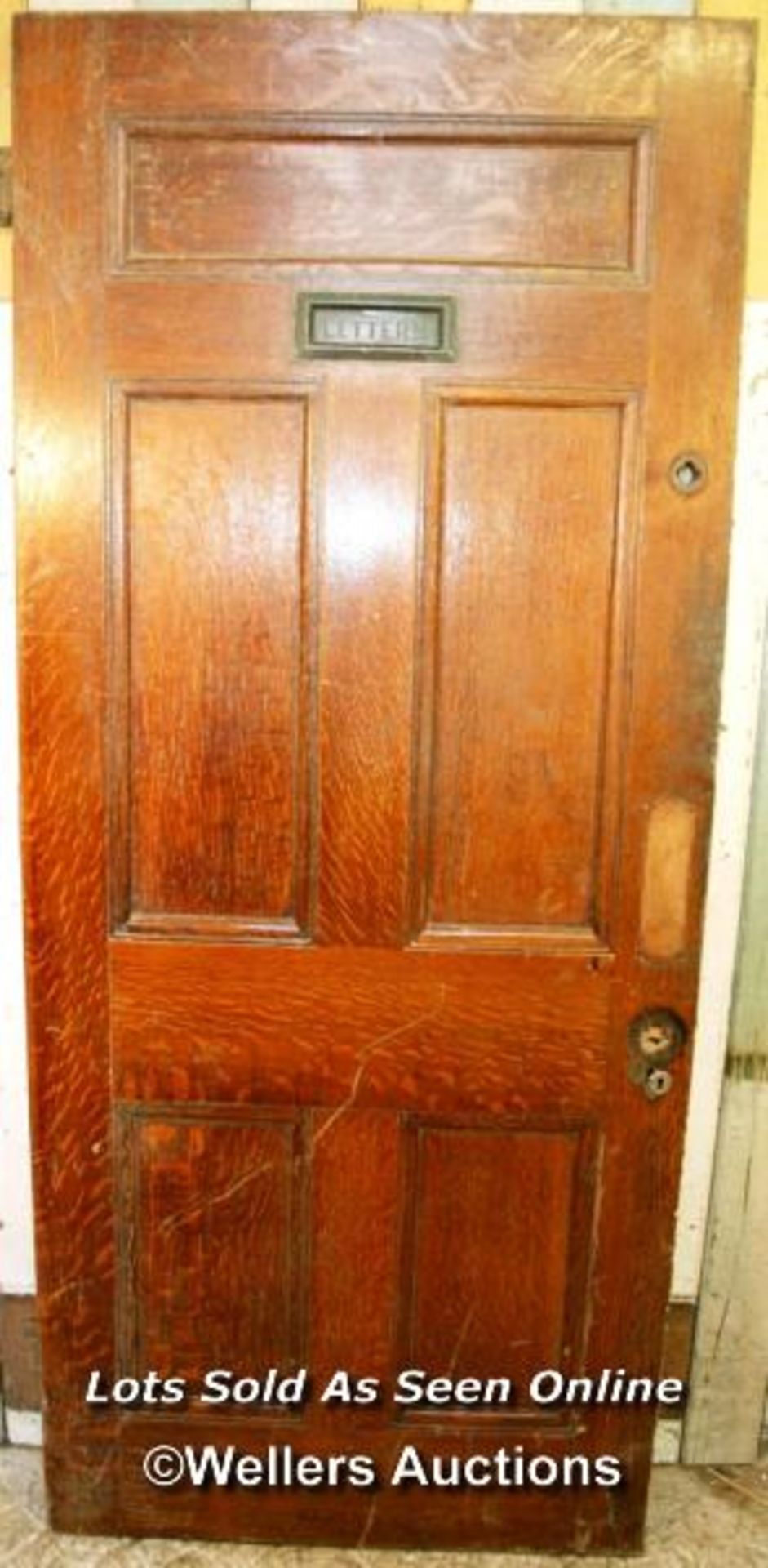 An Edwardian oak veneered door. Painted on one side. Letterplate to top of door. 91cm x 202cm x 4.