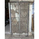 Pair of slim metal doors with handpainted stained glass. Some losses. Some small fragments included.