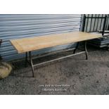 Dining table with cast iron base and reclaimed pine top. 8 to 10 seater. 240cm L x 88cm W x 76cm