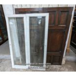 2 pairs of cupboard doors. A pair of beveled glazed painted pine door, 85cm x 128cm. A pair of oak