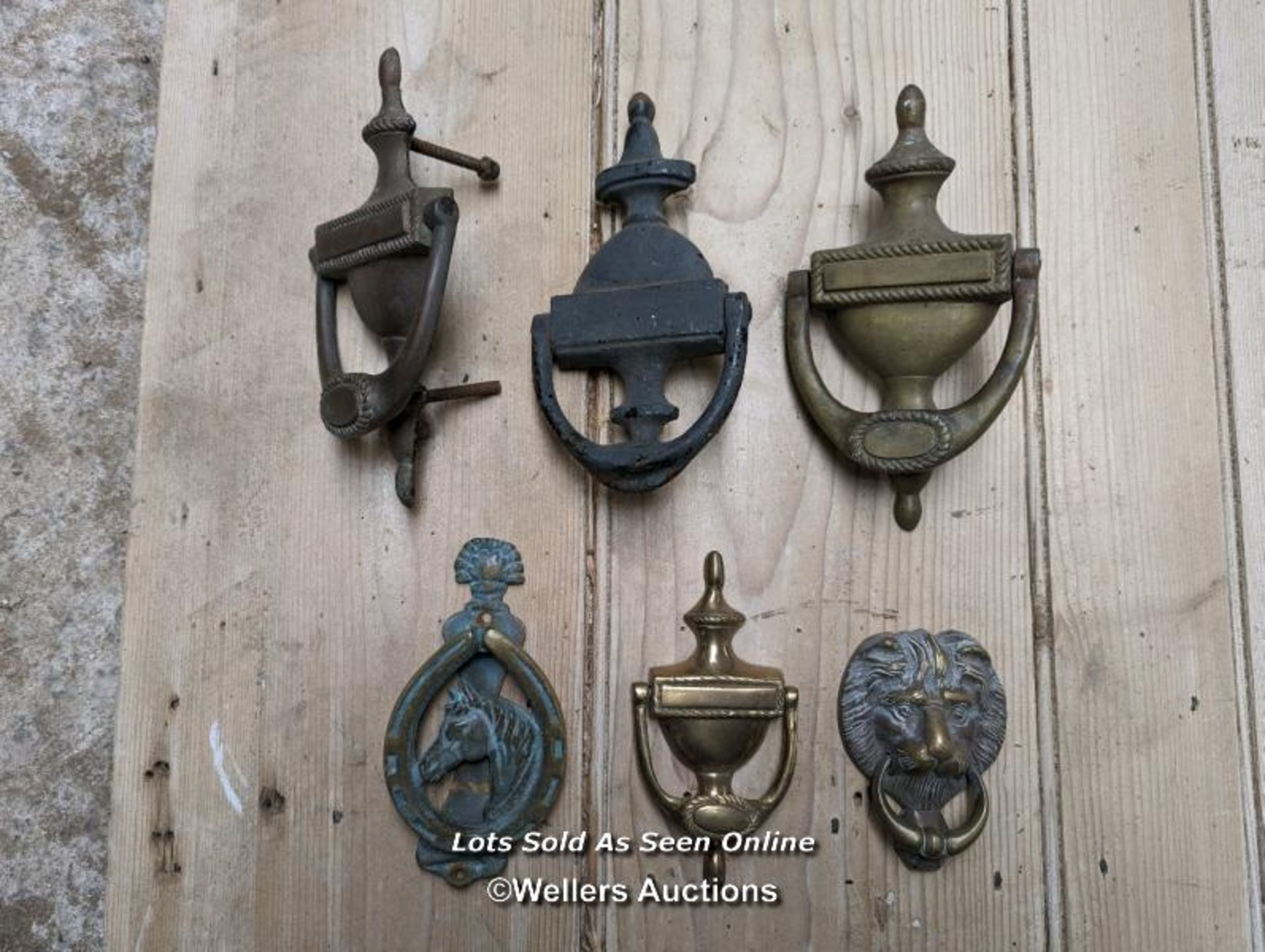 6 reclaimed brass door knockers. Some will need new bolts to hold them onto the door. Smallest