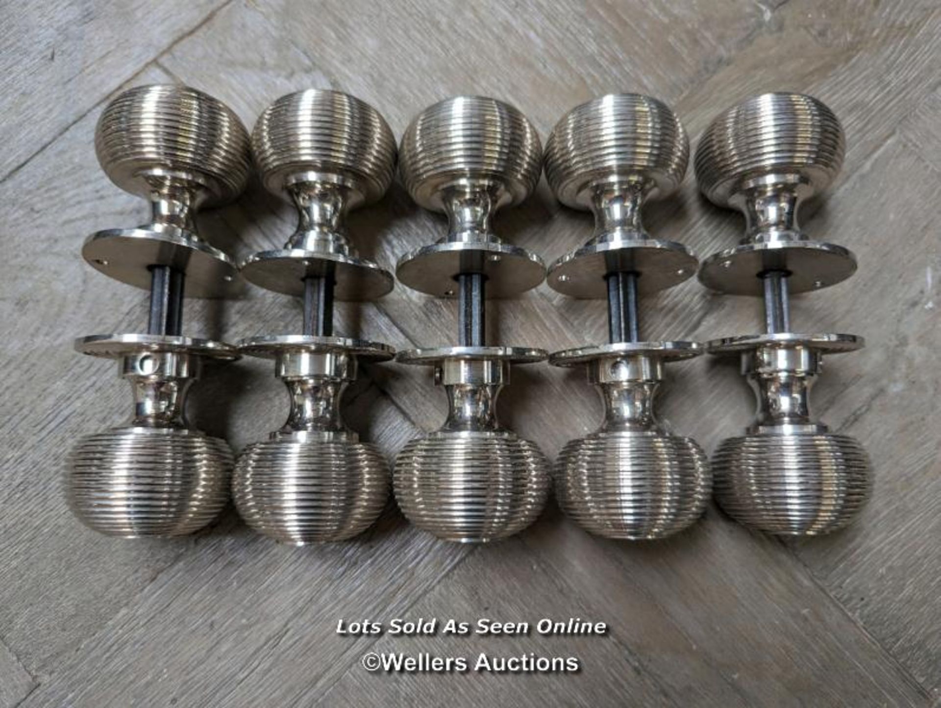 Set of good quality heavy nickel beehive reproduction handles, ex shop display. Back plates 5cm,