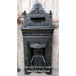 Original Victorian Cast iron bedroom fireplace. Combination design with decorative top with angel or