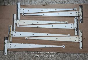 7 Victorian metal strap hinges. Approx 65cm long. Tapered with 'penny' ends