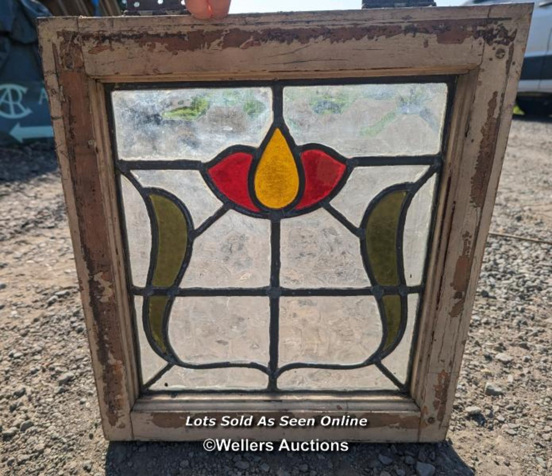 9 stained glass panels in pine frames. 2 frames missing one side. For restoration. Some breaks in