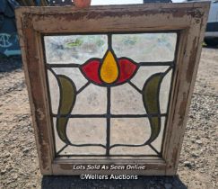 9 stained glass panels in pine frames. 2 frames missing one side. For restoration. Some breaks in