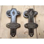 Rare cast iron pair of sliding door rollers stamped with makers mark, cast iron wheels. 23cm x 11cm