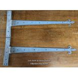 A pair of large hand forged Gothic strap hinges. Victorian. 93cm long