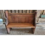 a small solid oak pew made from reclaimed pew elements. Handcarved pew ends. Size 92cm tall. 117cm