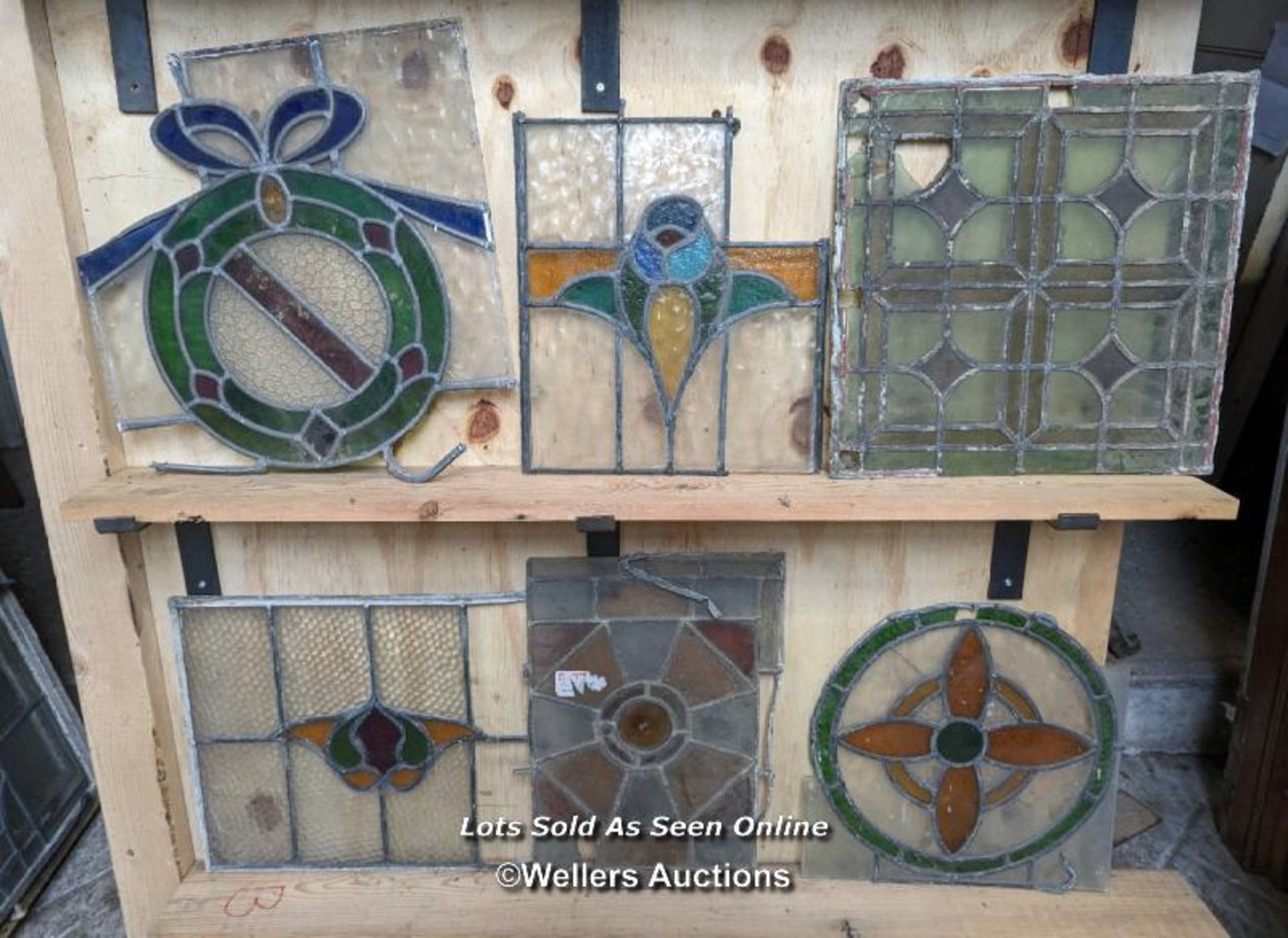 10 leaded stained glass panels in need of restoration. Some breaks in glass and lead missing. - Image 2 of 3