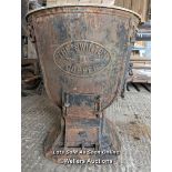An interesting garden feature. A large cast iron washer. The swinton copper. 77cm H x 69cm DIA at
