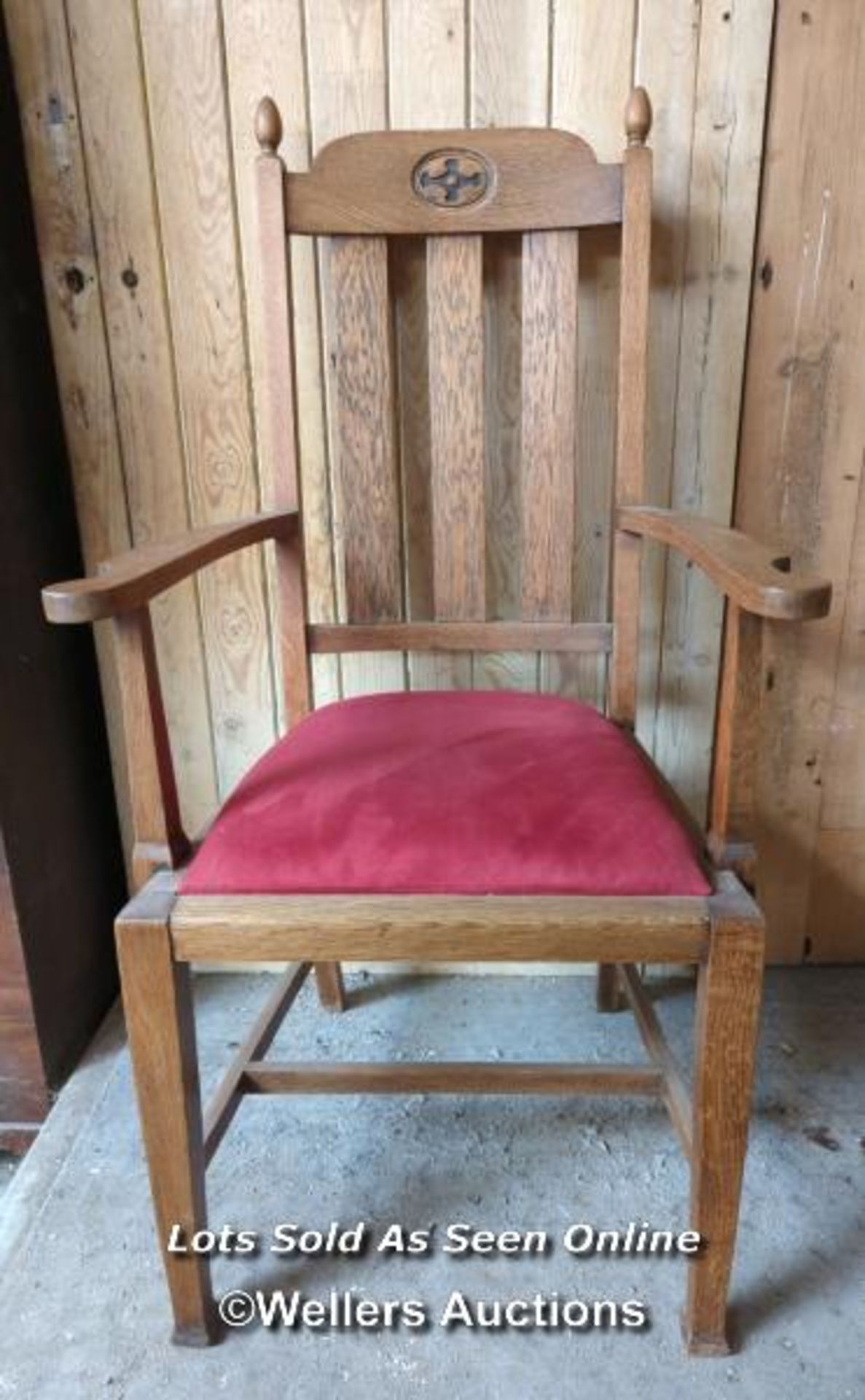Oak arts and crafts carved high back chair. Cushion seat. 113cm high. Good condition