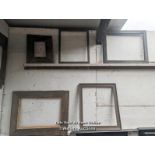 A collection of old picture frames and rustic timber frames needing restoration. Largest 54cm x 70cm